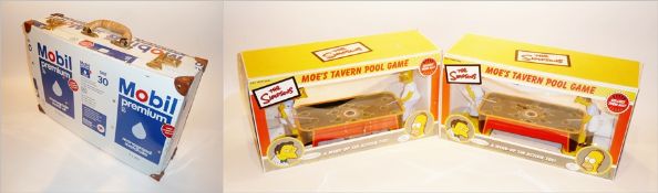 Clockwork tinplate "Moe's Tavern pool game", boxed, another and a Mobil Premium tinplate can