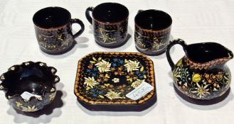 Late 19th century Swiss Thoune pottery, small jug, three matching cups, small bowl with inverted