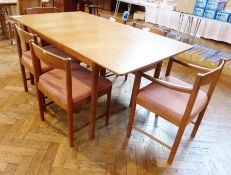 McIntosh teak draw-leaf dining table, rectangular on oval supports and matching six chairs each with