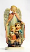 Hummel figure of an angel with two children