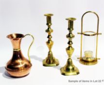 Quantity of copper and brass to include a pair of brass candlesticks, copper jug, trivet etc.