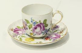 Vienna teacup and matching saucer with gilt fill rim, hand-painted with floral decoration, with
