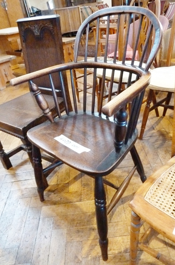 Stained elm and hardwood cane backed dining chair having turned rails, turned supports and H-