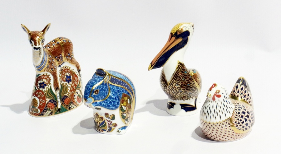 Four Royal Crown Derby paperweights with silver stoppers viz:- pelican, inscribed to base "John