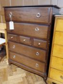 Stag Minstrel chest of four long drawers intersected by three short drawers, 82cm