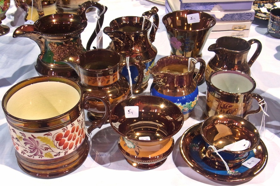 Quantity of copper lustre jugs, mug, vase and other items (10)