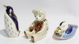Three Royal Crown Derby paperweights all with silver stoppers viz:- large penguin, seated teddy bear