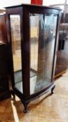 Modern mahogany effect display cabinet with cut glass bow fronted door, mirror-backed interior, on