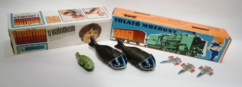 Czechoslovakian tinplate tractor, boxed, Chinese modern tinplate zeppelin, boxed, three tinplate