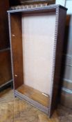 Oak bookcase having three shelves all with beaded borders, 63cm wide