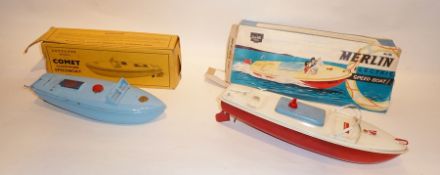 1950's Sutcliffe tinplate clockwork Comet speedboat, pale blue, in yellow box and a Sutcliffe