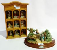 Border Fine Arts, the World of Beatrix Potter to include three wall display racks of nine figures,