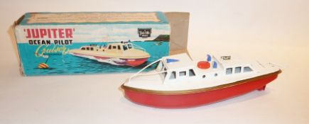 Sutcliffe tinplate clockwork Jupiter Ocean Pilot Cruiser, with red hull, in box