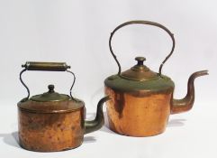 Two 19th century copper kettles, one circular, one oval