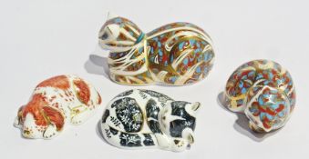Four Royal Crown Derby paperweights two with gold stoppers, two with silver stoppers viz:- puppy "