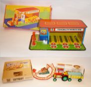 Czechoslovakian tinplate tractor and trailer, clockwork, boxed, tinplate petrol station, boxed and