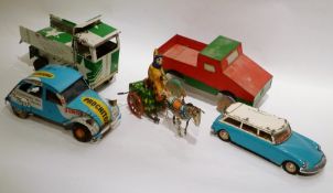 A German tinplate car, Chinese tinplate car, tinplate tortoise, tinplate clown with donkey, three