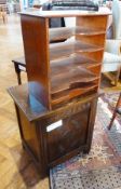 Bevan Funnell reproduction oak log box, with carved framed panel front and stained wood stationery