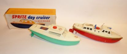 Sutcliffe tinplate clockwork Sprite Day Cruiser with green hull, cream deck, boxed and a Sutcliffe