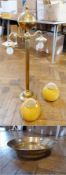 Large brass two-light table lamp with sear to the top of the reeded column, two scroll branches with