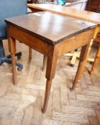 Stained wood school desk having lift up top on turned supports