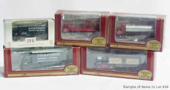 Quantity of boxed diecast models to include Pickfords vans, lorries, tankers and coaches together