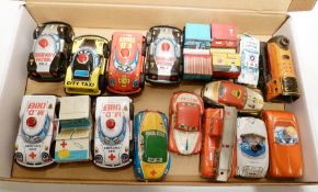 Japanese tinplate ambulance car, red taxi car, fire department car, three Chinese tinplate cars, one