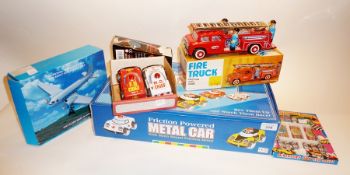 Modern Tobar tinplate friction powered metal car, boxed, four other loose cars, Chinese modern