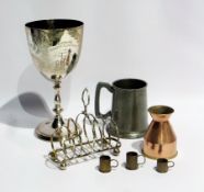 Quantity of silver plate to include a large trophy cup, six division toast rack, a bonbon dish, jugs