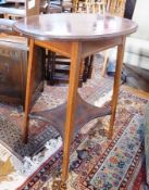 Edwardian inlaid mahogany occasional table, oval with shaped rectangular undershelf, bow