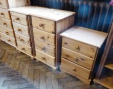 Pair pine narrow chests of drawers, each of four long drawers with turned knob handles and another