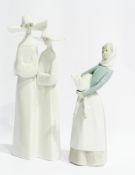 Lladro figure of two nuns in white and Lladro figure of shepherdess holding lamb