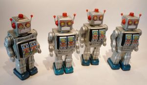 Four Chinese tinplate battery operated "Space Walkman" tinplate robots, battery operated, boxed (4)