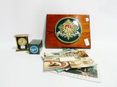 Brass memorial plaque, George VI, painted hinged box enclosing postcards and various presentation