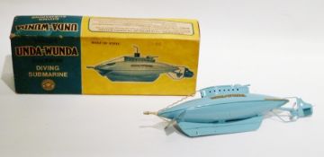 Sutcliffe tinplate clockwork "Unda-Wunda" diving submarine, pale blue in yellow and blue box