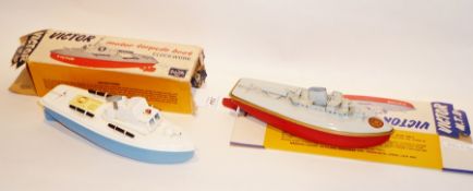 Sutcliffe tinplate clockwork Victor Motor Torpedo Boat with blue hull, boxed, a similar spare box