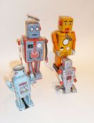 Four Chinese modern tinplate robots, tinplate race car, and two robots in need of repair
