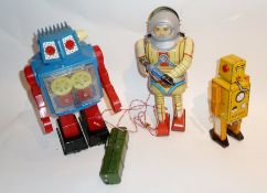 1980's Chinese reproduction spaceman with gun robot, three "Robot Lilliputs", three other various