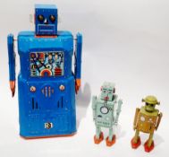 Chinese modern tinplate robot, unboxed, three Schylling Chinese modern tinplate "Roxy Robot",