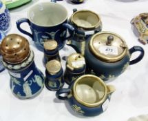 Quantity of Wedgwood blue jasperware to include sugar sifter, salt and pepper, teapot and other