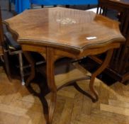 A late Victorian rosewood centre table with wavy edge top, inlaid central medallion, on square