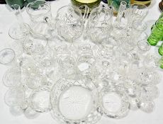 Quantity of assorted glass to include:- jugs, wines, vases, sundae dishes, brandy balloons, bowls