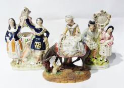 Two Staffordshire flatback figure groups and a lady riding a donkey (3)