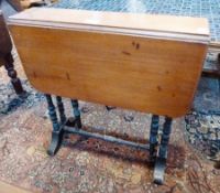 A mahogany Sutherland table, with turned supports united by stretchers, 54 cm wide