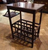 An Edwardian mahogany rectangular top occasional table with folding tray to side, and fitted