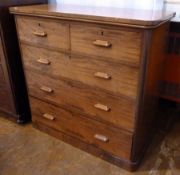 Victorian mahogany chest of two short and three long graduated drawers raised on a plinth base,