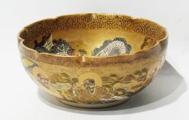 Satsuma pottery bowl, circular, with serpentine rim, decorated and jewelled allover deities and