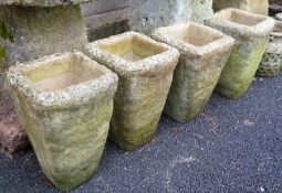 Four vase-shaped stone pots, 37 x 27cm