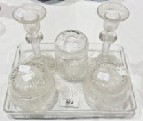 Early 20th century clear, cut and engraved glass dressing table set, wheel engraved, to include:-