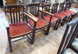 Set of six oak dining chairs, with curved toprail, slatback, red inset stuffover seat, on turned